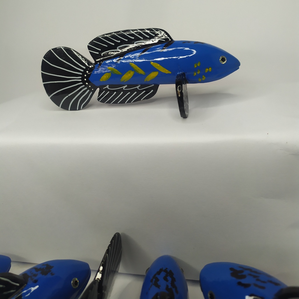 patung kayu channa pulcra