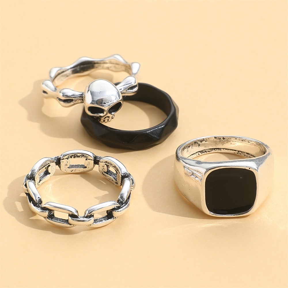 Tren Fashion Hitam Tua Gaya Set Cincin Hitam Drip Rantai Cincin Tengkorak Kepala Perlindungan Lingkungan Alloy Ring 4buah