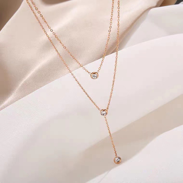 Kalung Rantai Klavikula Bahan Titanium Steel Plated 18K Rose Gold Aksen Berlian Rumbai Gaya Korea Untuk Wanita