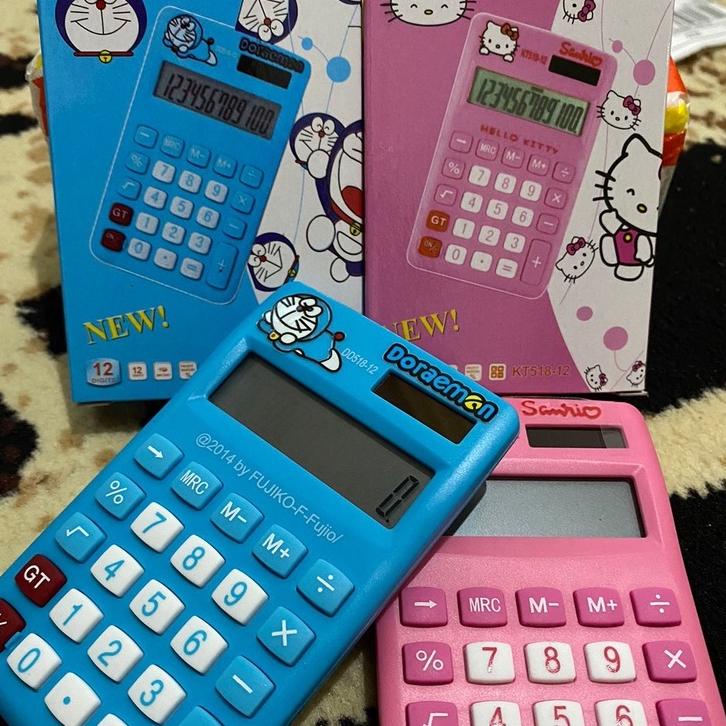 

Y80 KALKULATOR MINI DORAEMON & HELLOKITTY HOT お
