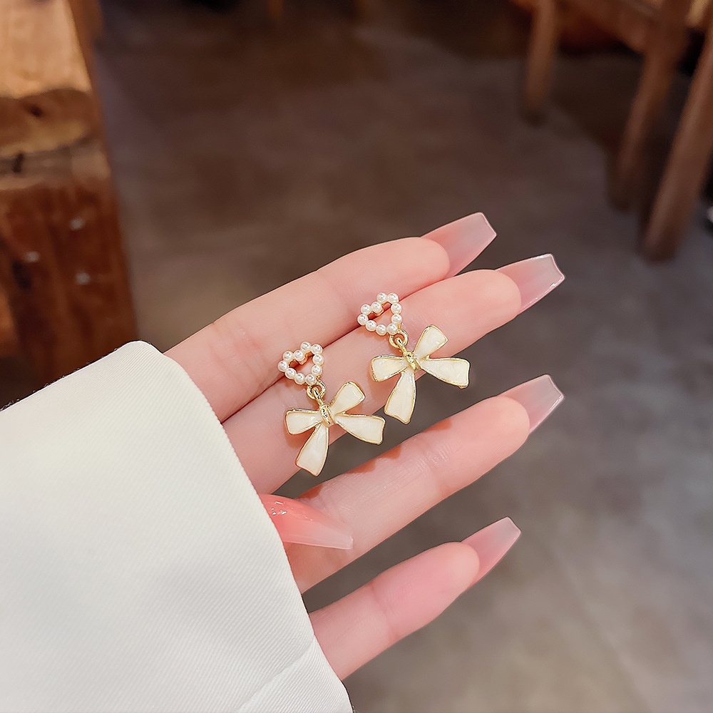 Modis Berkelas Gaya Selebriti Cahaya Mewah High-End Anting Jarum Perak Perempuan Cinta Busur Niche Desain Mutiara Anting Earrings