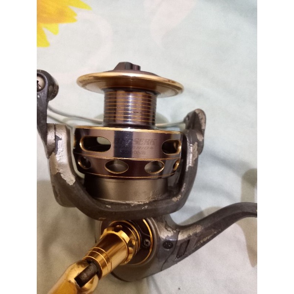 reel bossna berserk hybrid 5000 sw putaran smoth minus cat banyak yg mengelupas