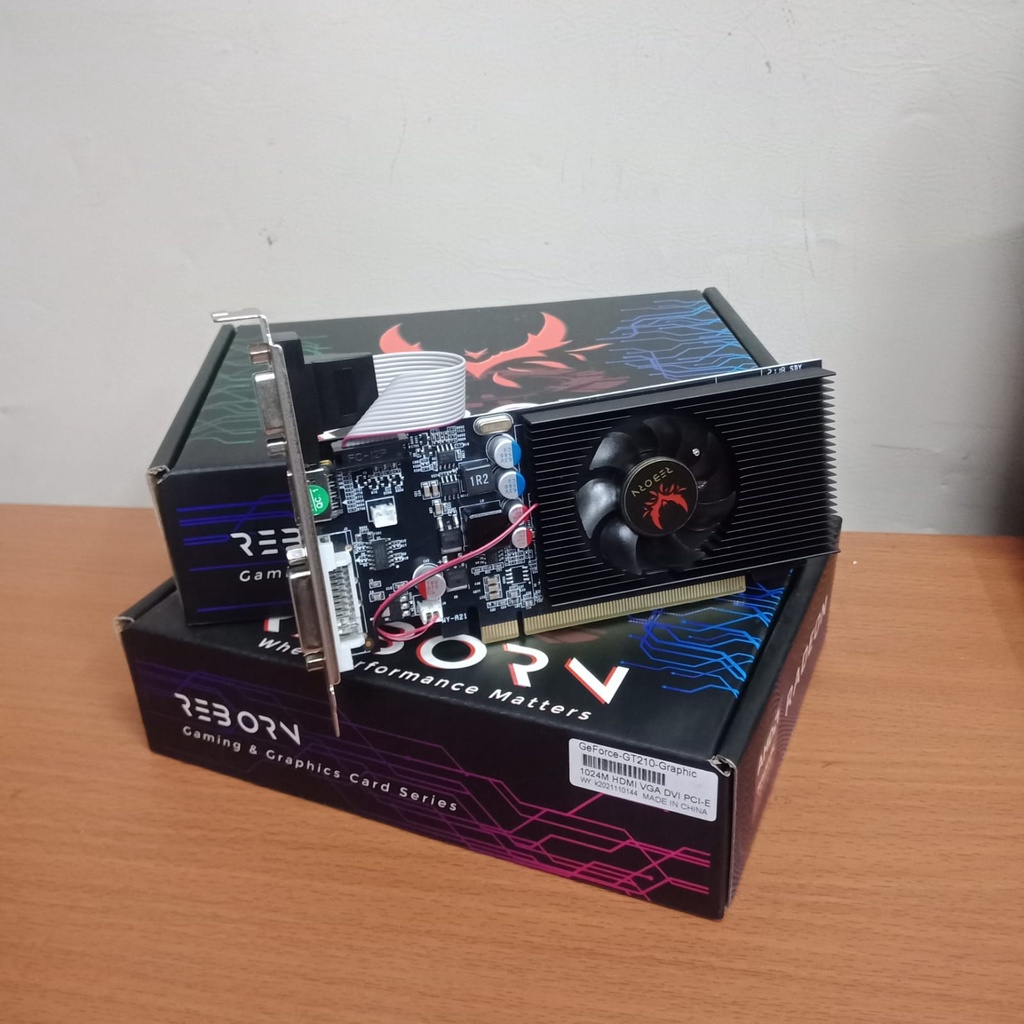 VGA GEFORCE VGA REBORN GAMING NVIDIA  PCI XPRESS  GT210 1GB DDR3 64BIT SISTEM GARANSI 1 TAHUN