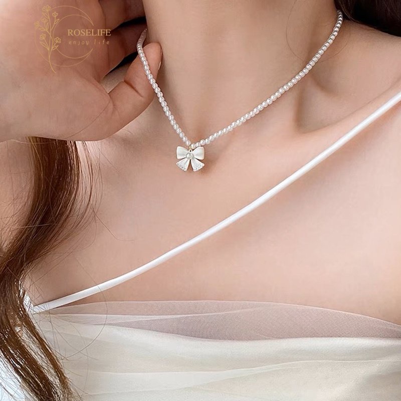 Roselife Korea Lucu Busur Putih Mutiara Manik-Manik Choker Kalung Untuk Wanita Gadis Elegan Ikatan Simpul Pesona Pendek Rantai Kalung Perhiasan Hadiah