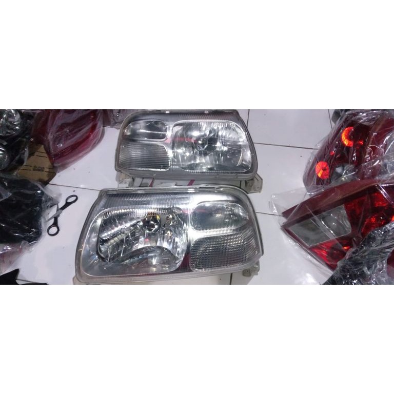 onderdil lampu depan headlamp mobil bekas suzuki escudo 2.0 original