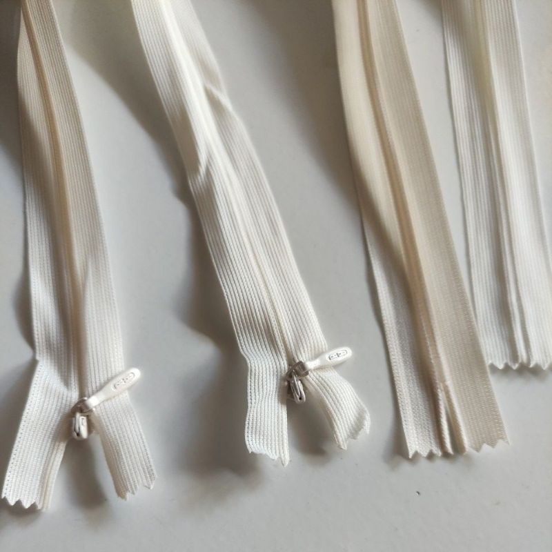 resleting jepang cream / resleting jepang RH / rest / zipper