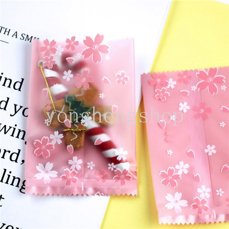 100pcs / set Kantong Kemasan Kue / Permen / Biskuit Motif Bunga Sakura Pink Ukuran 7x10cm Untuk Pesta