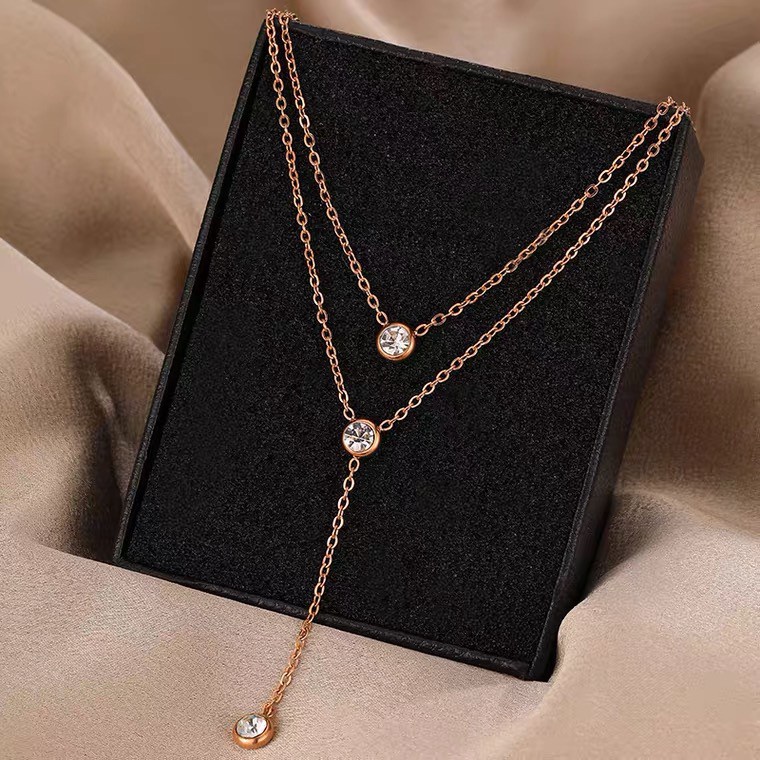 Kalung Rantai Klavikula Bahan Titanium Steel Plated 18K Rose Gold Aksen Berlian Rumbai Gaya Korea Untuk Wanita