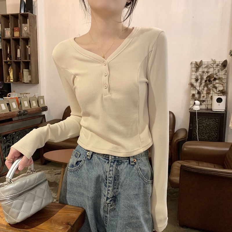 Red Hot girl short bottoming T-shirt wanita musim semi versi Korea dari baru slim slim V-neck button chic inner long-sleeve top