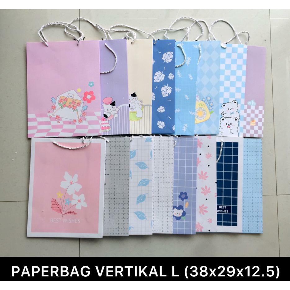 

PAPER BAG VERTIKAL / TAS KADO KARTON PREMIUM DENGAN TALI NILON UKURAN L (38*29*12,5 CM)