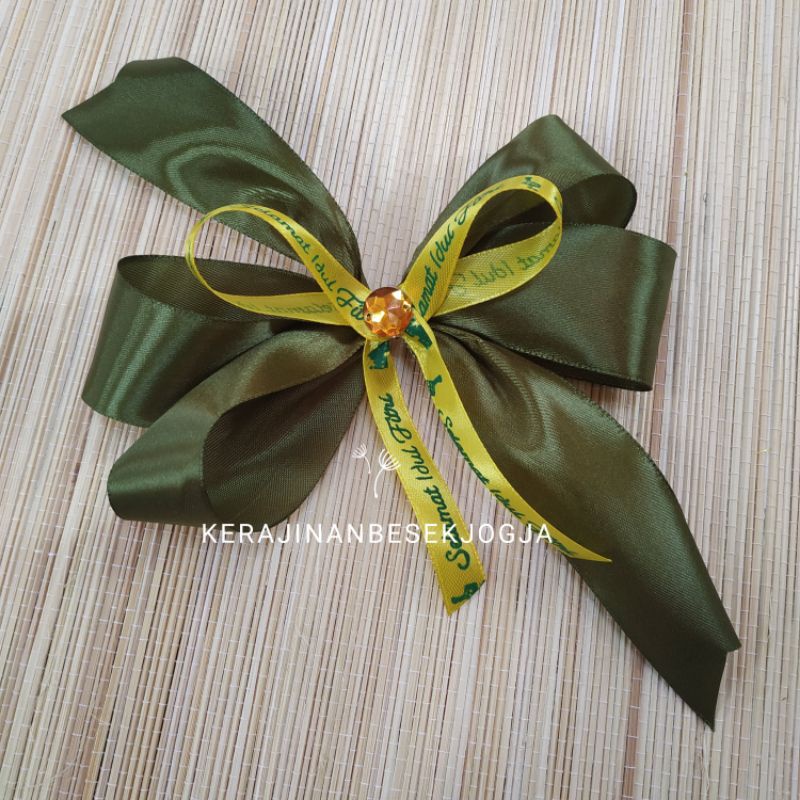 

PITA LEBARAN / pita satin pita murah pita besek pita hampers pita Jogja pita murah pita lebaran