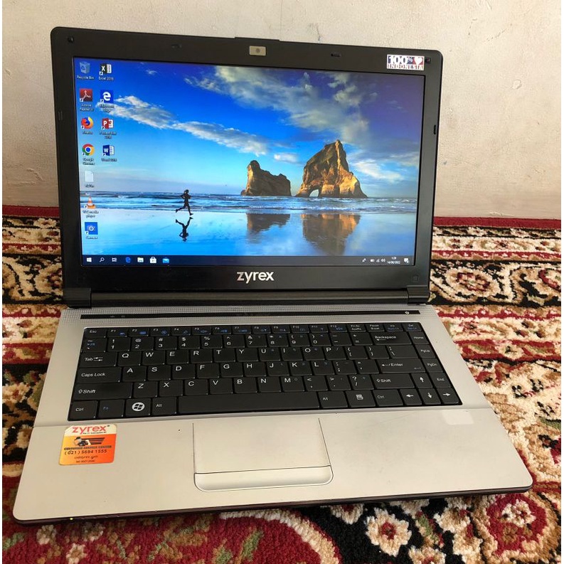 laptop zyrex E4105 core i3,,ram4gb,,minus baterai