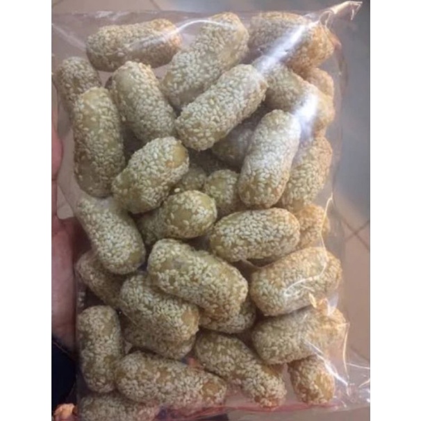 

Camilan kue kering MANCHO Wijen, Taik kucing Manis, 500 gram Lezat