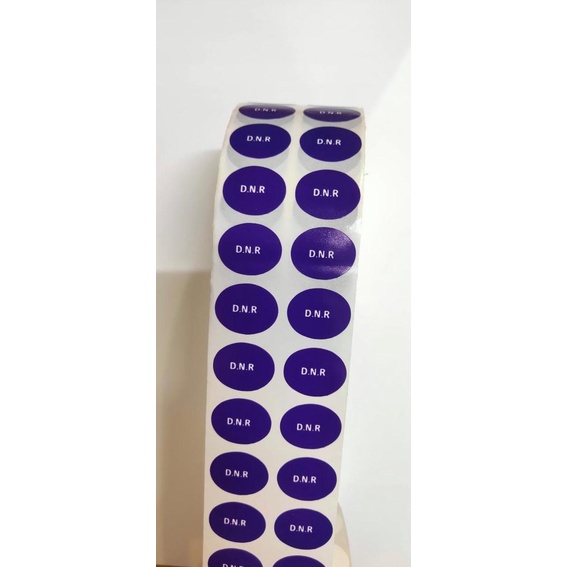

STIKER DNR UNGU OVAL TULISAN PUTIH 20X16mm @5000 pcs in ROLL