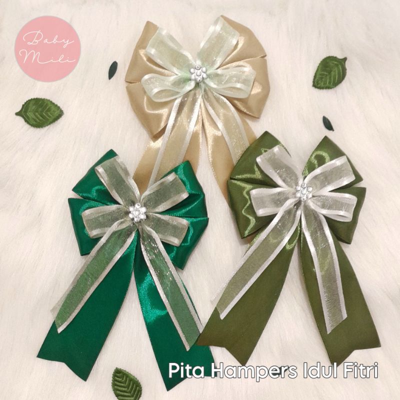 

Pita Hampers PL-B02, PL-B03, PJB-01 / Pita Lebaran / Pita Jadi / Aplikasi Pita Tempel / Pita Idul Fitri