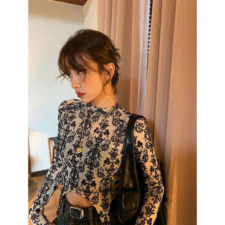 Red Musim semi baru slim fit dan tipis gaya floral retro tidak teratur Hyun Ya angin top bottoming kemeja ceruk leher bulat kecil