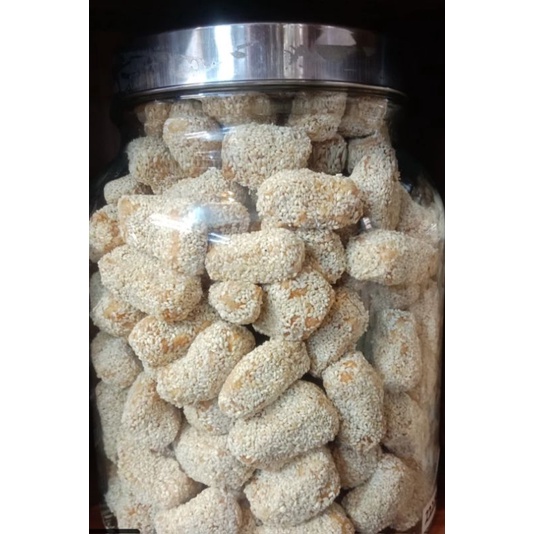 

Camilan kue kering MANCHO Wijen, Taik kucing Manis, 1 kilogram Lezat a