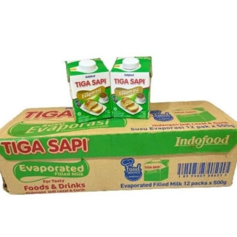 

susu evaporasi tiga sapi 500 gr per dus evaporated milk tiga sapi grab/gojek only