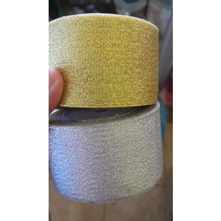 

Pita Kain Satin Warna Emas dan Silver Lebar 6 cm. JUAL PER METER.