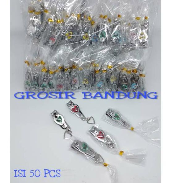 

Dijamin Sampai ( ISI 50 PCS ) SOUVENIR GUNTING KUKU HATI