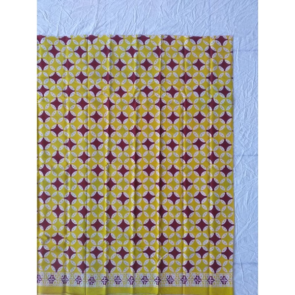 Batik garutan dua warna kawung kuning-ungu