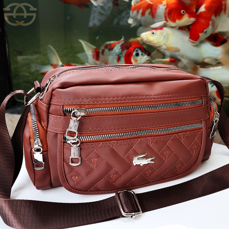 Akaci Tas Selempang wanita resleting 5 bordir Nilon super kekinian Slingbag Korea 06-6833 mango