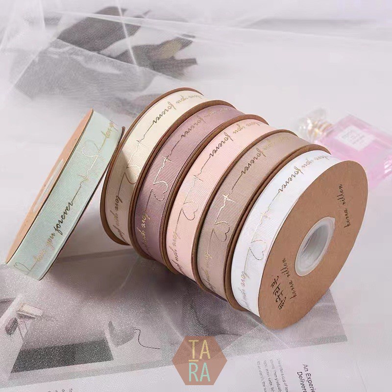 

pita cetak bronze 2.5cm dan kado per meter