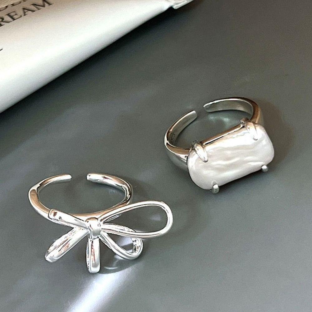 Needway  Wanita Pembukaan Cincin Kepribadian Unik Indah Mutiara Jari Cincin Niche Desain Busur Tembaga Sederhana Gaya Korea Cincin