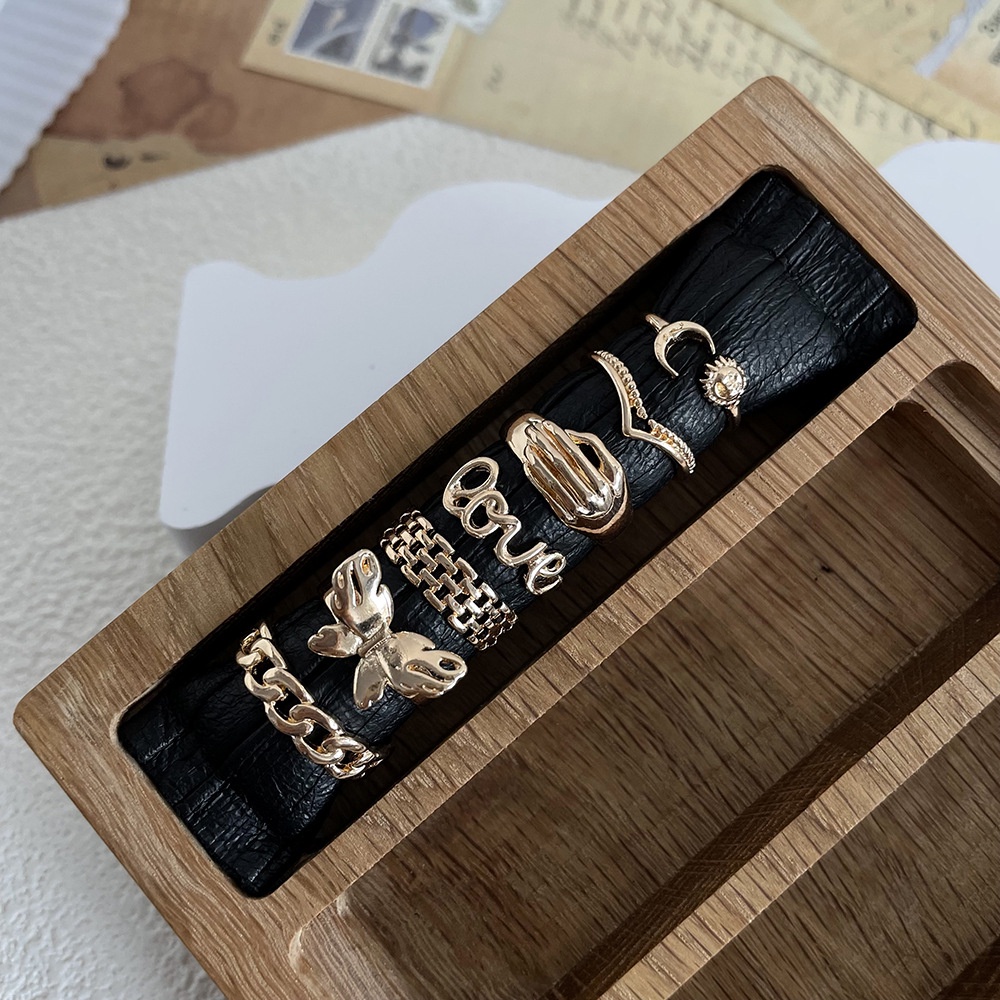 Fashion Trend Kupu-Kupu Cincin Inse Gaya Eropa Dan Amerika Logam Cincin Matahari Dan Bulan Surat Cinta Cincin 7-piece Set