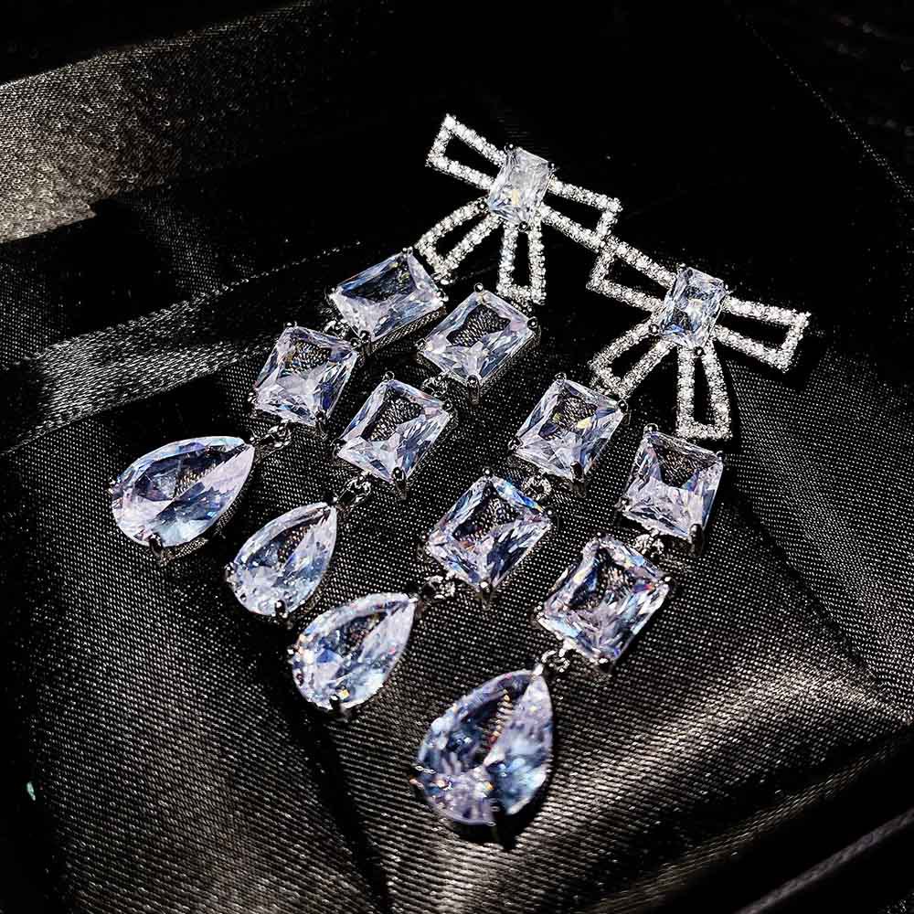 Goldkingdom Aksesoris Perhiasan Fashion Ready Stock Niche Desain Eropa Dan Amerika Serikat Suasana Busur Menetes Penuh Bor Wanita Giwang Anting Panjang