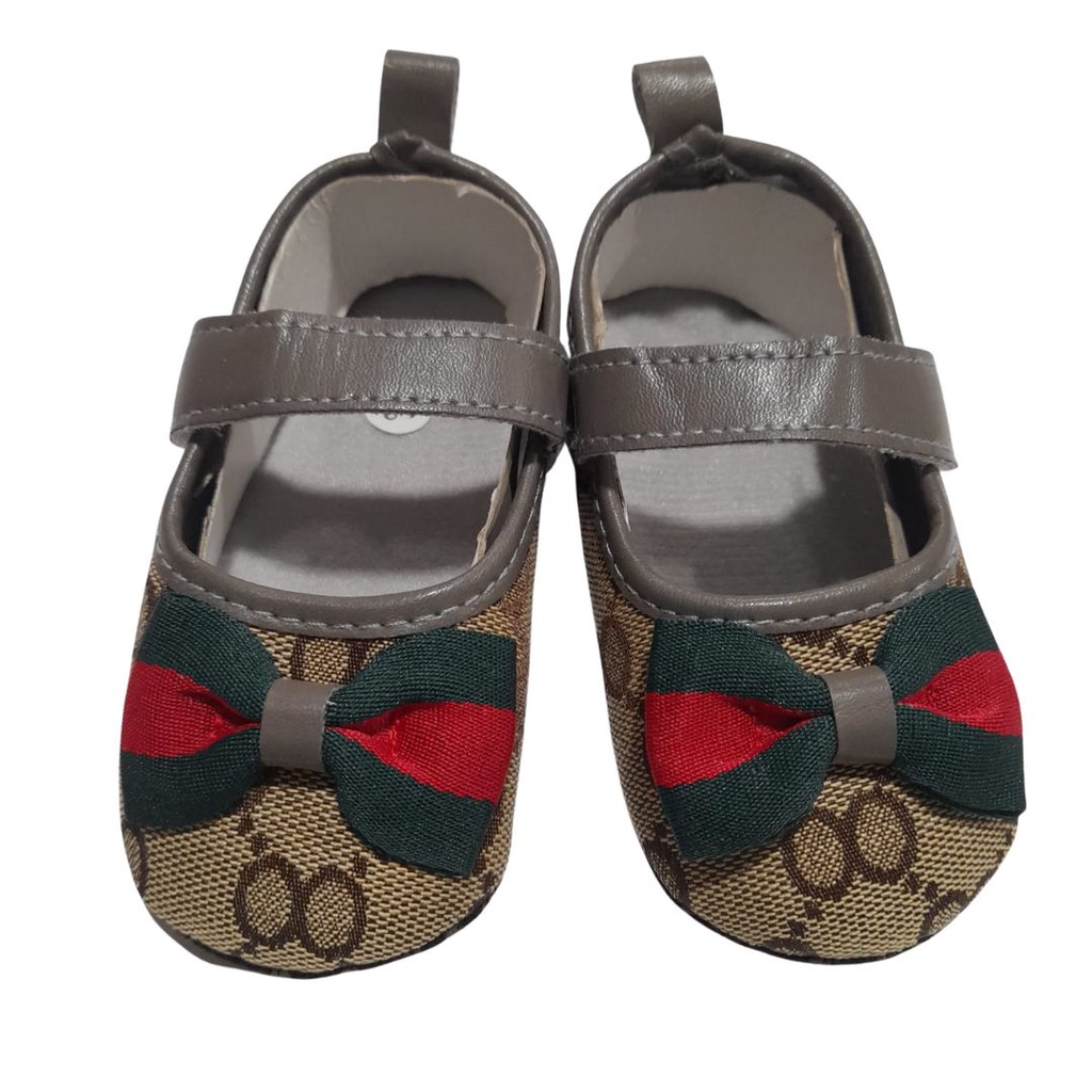 SEPATU GUCI PITA MERAH