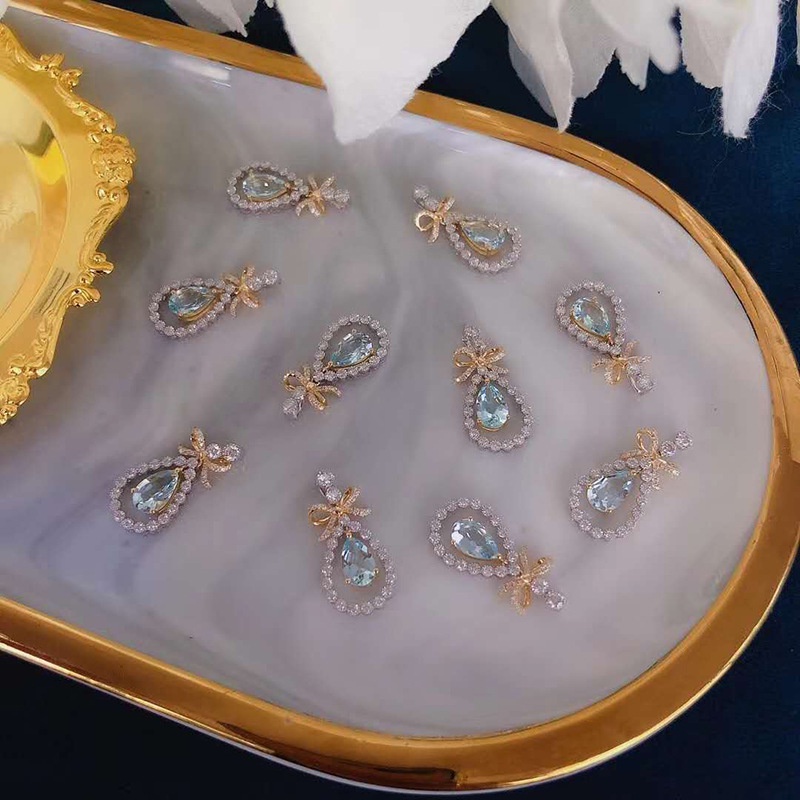 Goldkingdom Fashion Perhiasan Aksesoris Ready Stock Busur Klavikula Rantai Imitasi Brazil Aquamarine Liontin Berlapis Dengan Emas Asli Kadar 375 18k Imitasi Zirkon Topa Biru Drop Kalung.