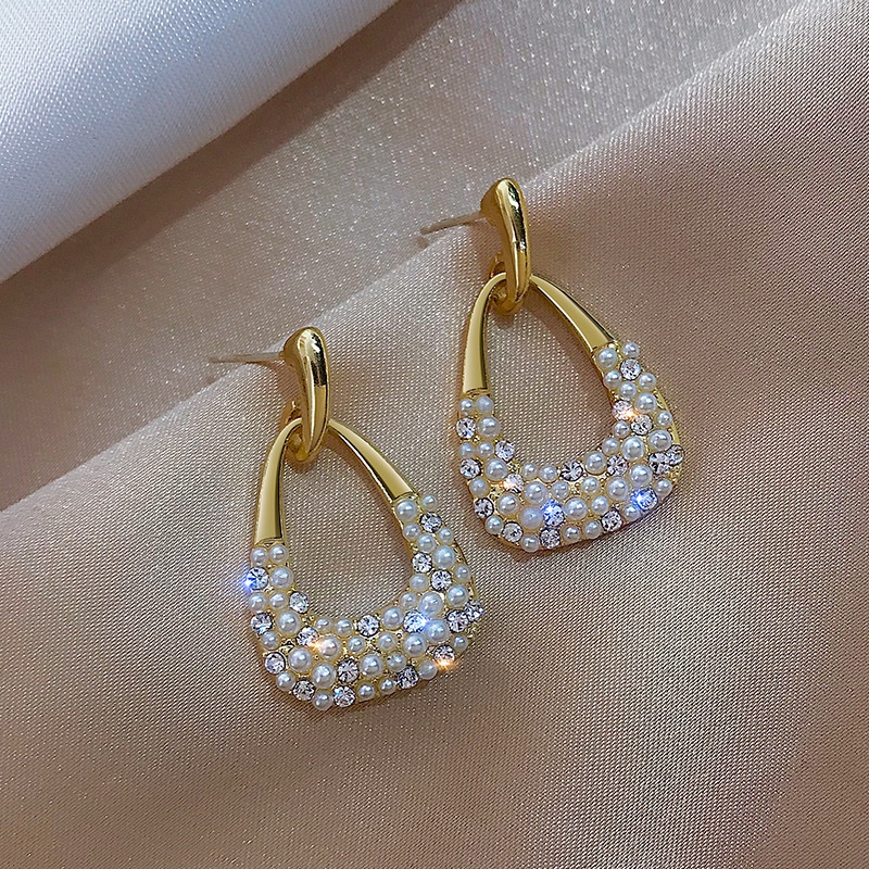 Anting Perak925 Jarum Berlian Mutiara Berongga Tas Kecil Anting Desain Korea Anting Mewah Ringan Anting Unik