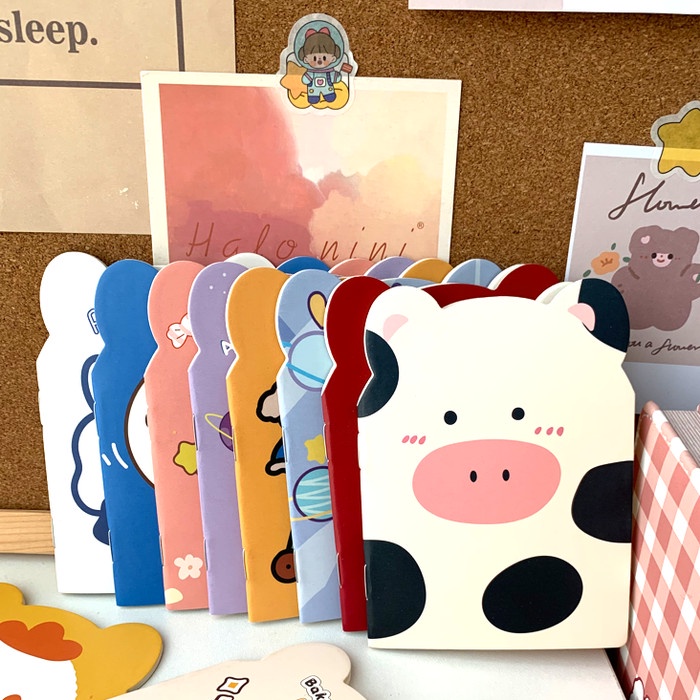 

BUKU TULIS MINI MOTIF CARTOON / NOTEBOOK KECIL MOTIF ANIMAL BERTELINGA - RANDOM