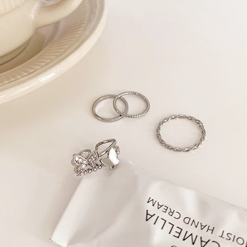 Papaozhu 4 Pcs Bergaya Zirkon Bersinar Perak Kupu-Kupu Terbuka Cincin Untuk Wanita Perempuan Sederhana Memutar Dapat Ditumpuk Cincin Set Keren Jari Aksesoris