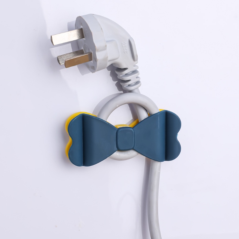 Portable PP Self-adhesive Bow Tie Shape Cord Winder/Dipasang Di Dinding Tanpa Meninju Pengisian Kawat Plug Tetap Rak/Peralatan Rumah Tangga Klip Penyimpanan Kabel