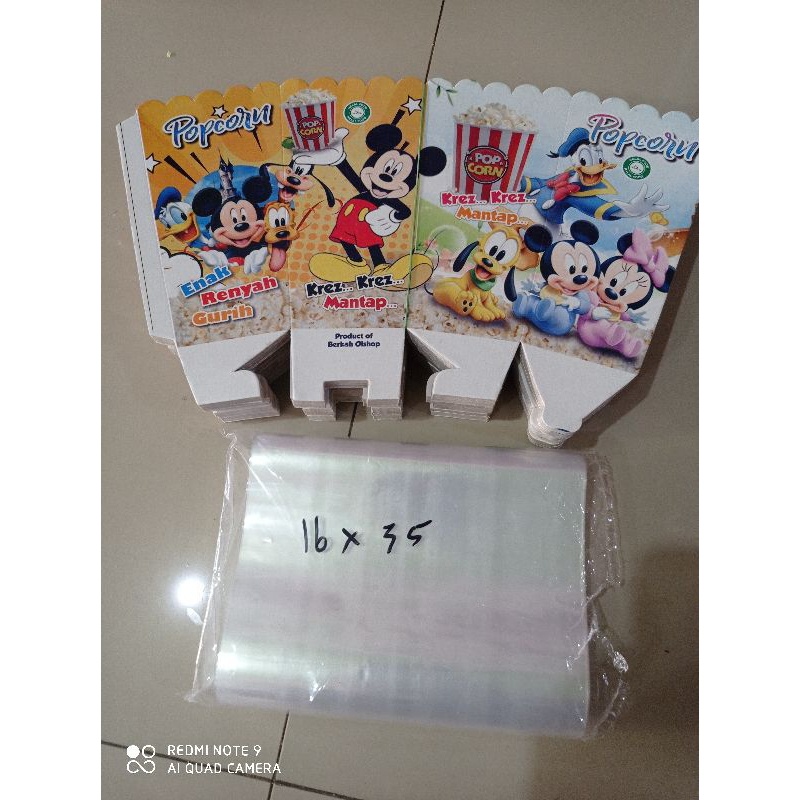 

kertas popcorn 14x8 cm dan plastik popcorn 16x35 cm sepaket