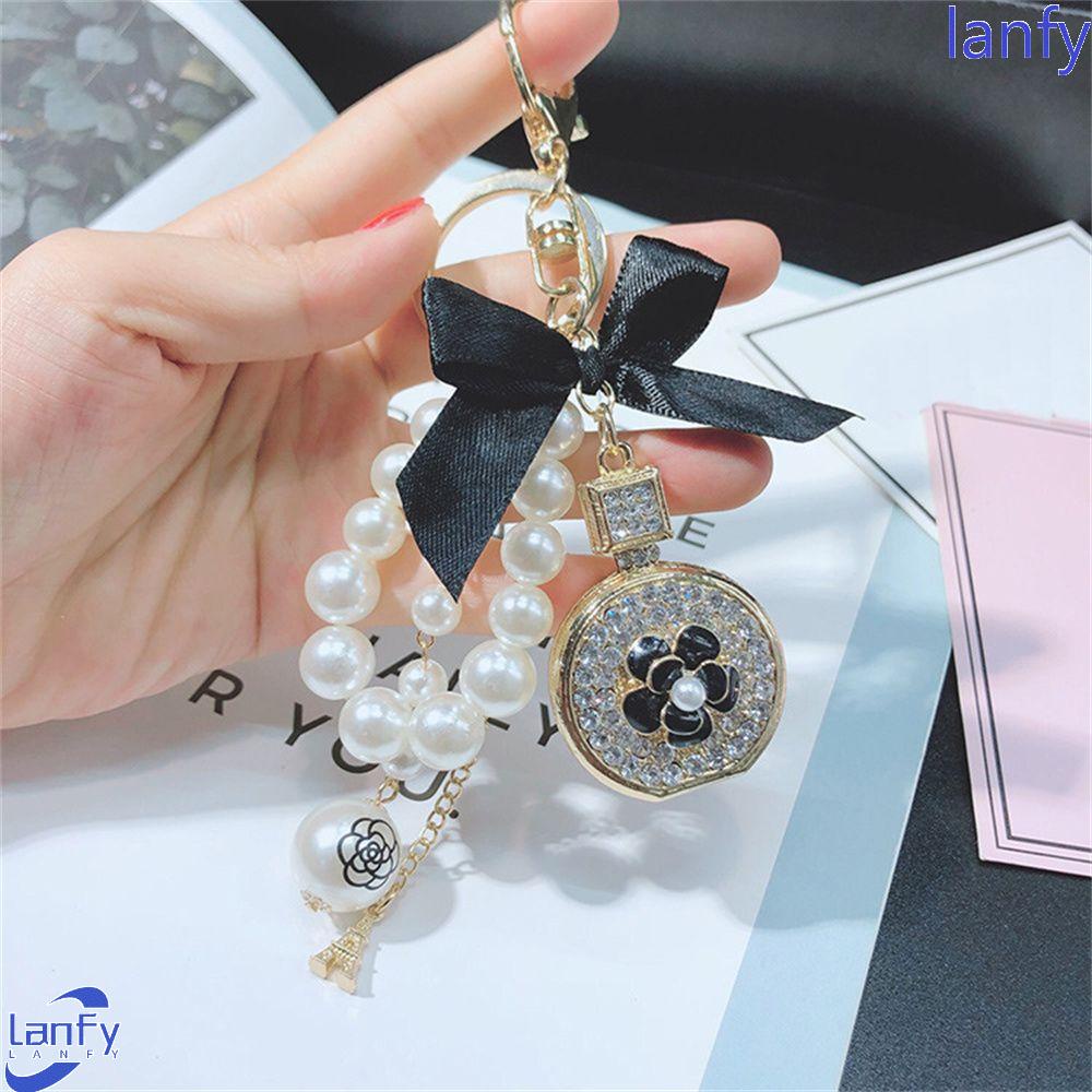 LANFY Gantungan Kunci Botol Parfum Ikatan Simpul Logam Khusus Aksesoris Interior Ransel Liontin Busur Kristal Keyrings