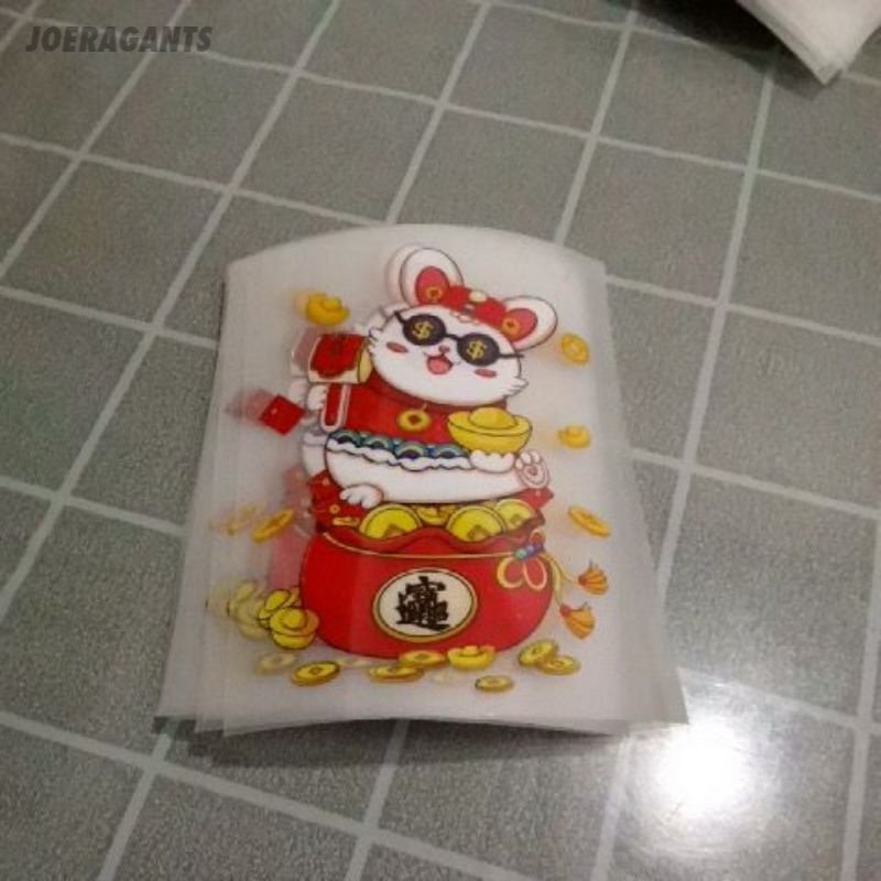 

SABLON DTF TEMPEL GOSOK STIKER KUALITAS PREMIUM BOLEH SATUAN CNY IMLEK JLO