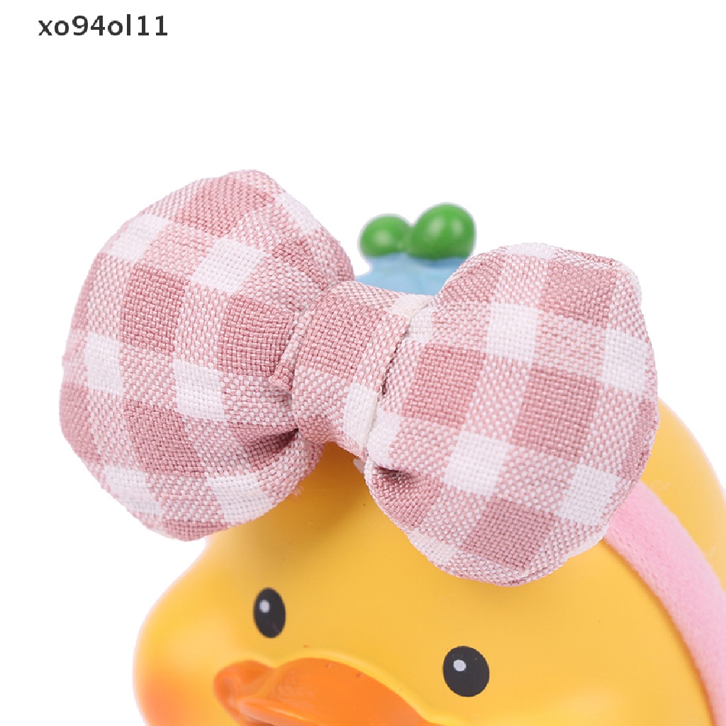 Xo Ornamen Mobil Lucu Resin Busur Bando Bebek Goyang Kepalanya Boneka Dekorasi OL