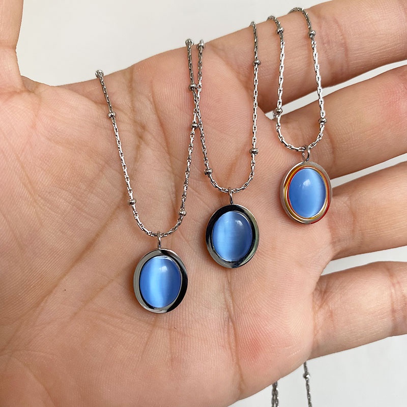 Kalung Titanium Steel Mata Kucing Oval Biru Gaya Retro Perempuan Anti Karat Lapis Emas Rantai Klavikula