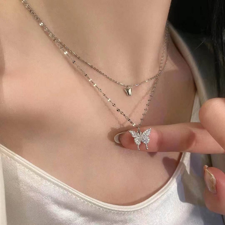 2023kalung Kupu-Kupu Ganda Gaya Baru Desain Influencer Wanita Merasa ins Rantai Klavikula Cahaya Mewah Niche Liontin Kalung