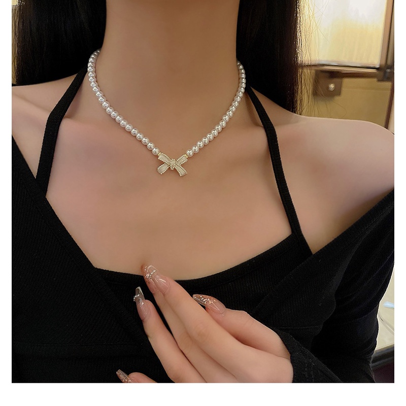 Kalung Busur Mutiara Temperamen Peri Super Baru Desain Niche Perempuan Rantai Klavikula High-End Kalung Trendi