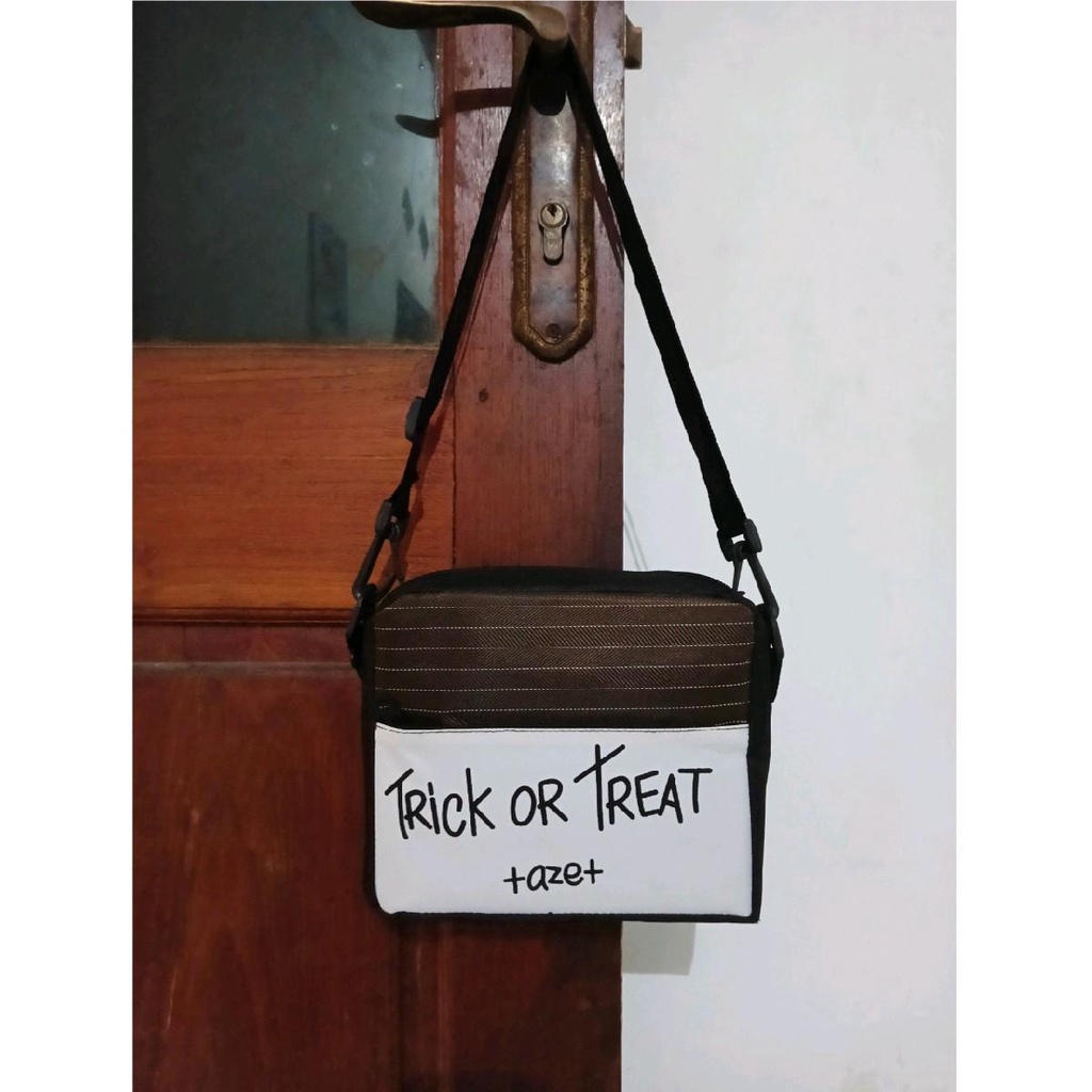 New tas selempang pria wanita motif trick or treat kekinian yang lagi trending termurah