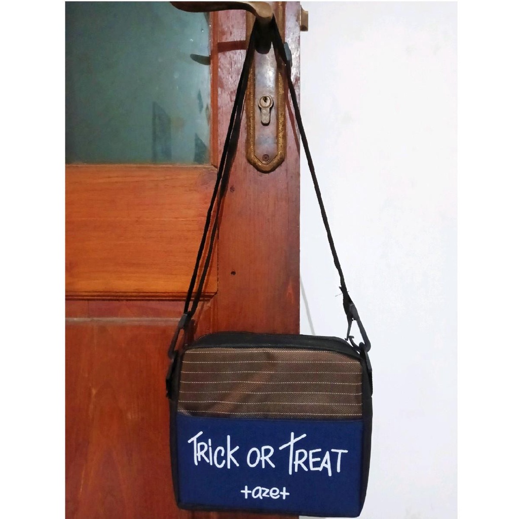 New tas selempang pria wanita motif trick or treat kekinian yang lagi trending termurah