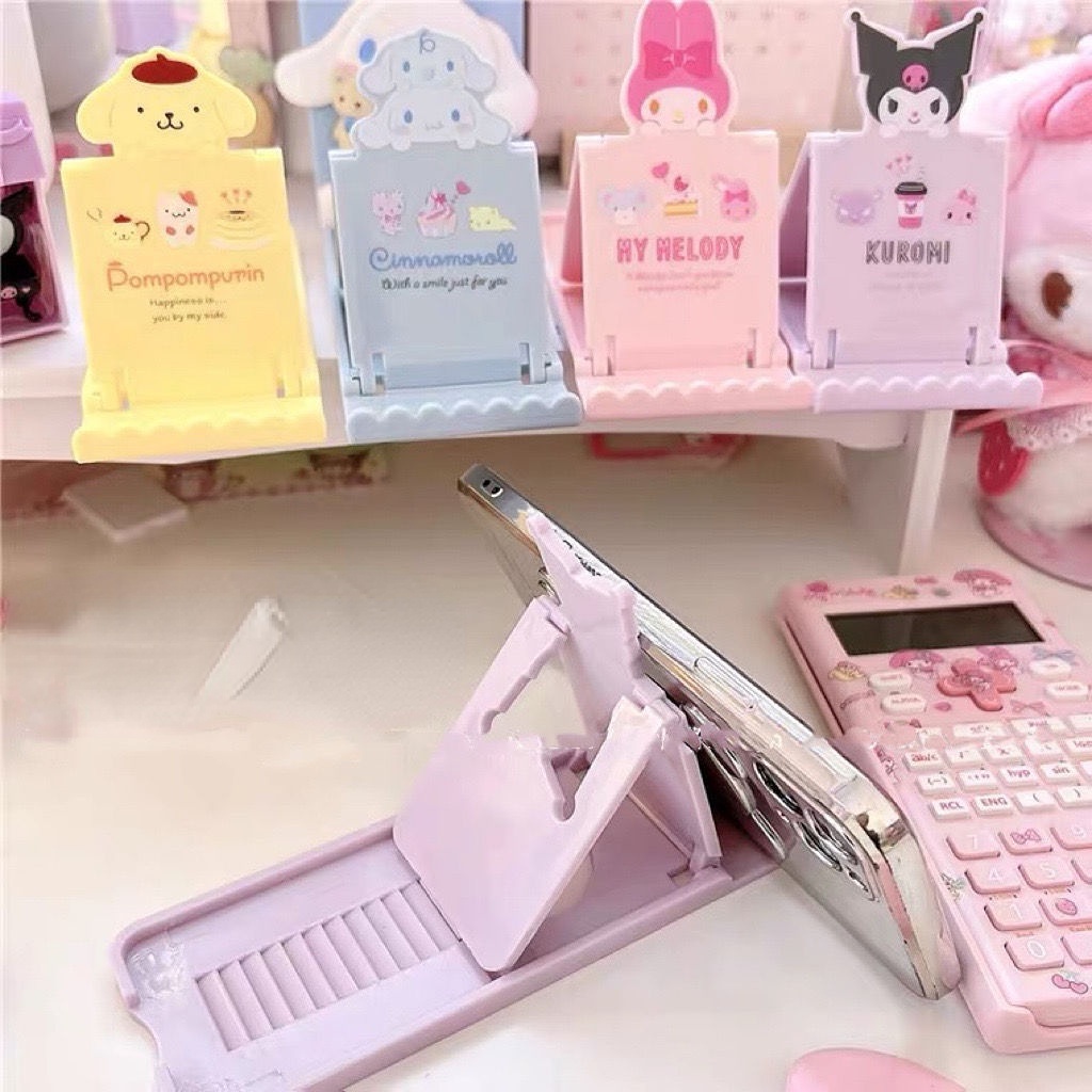 Kuromi Kartun Phone Holder Cinnamoroll Berlubang Desktop Lazybone Phone Holder Base Desktop Ornamen Hias Dapat Dilipat Holder