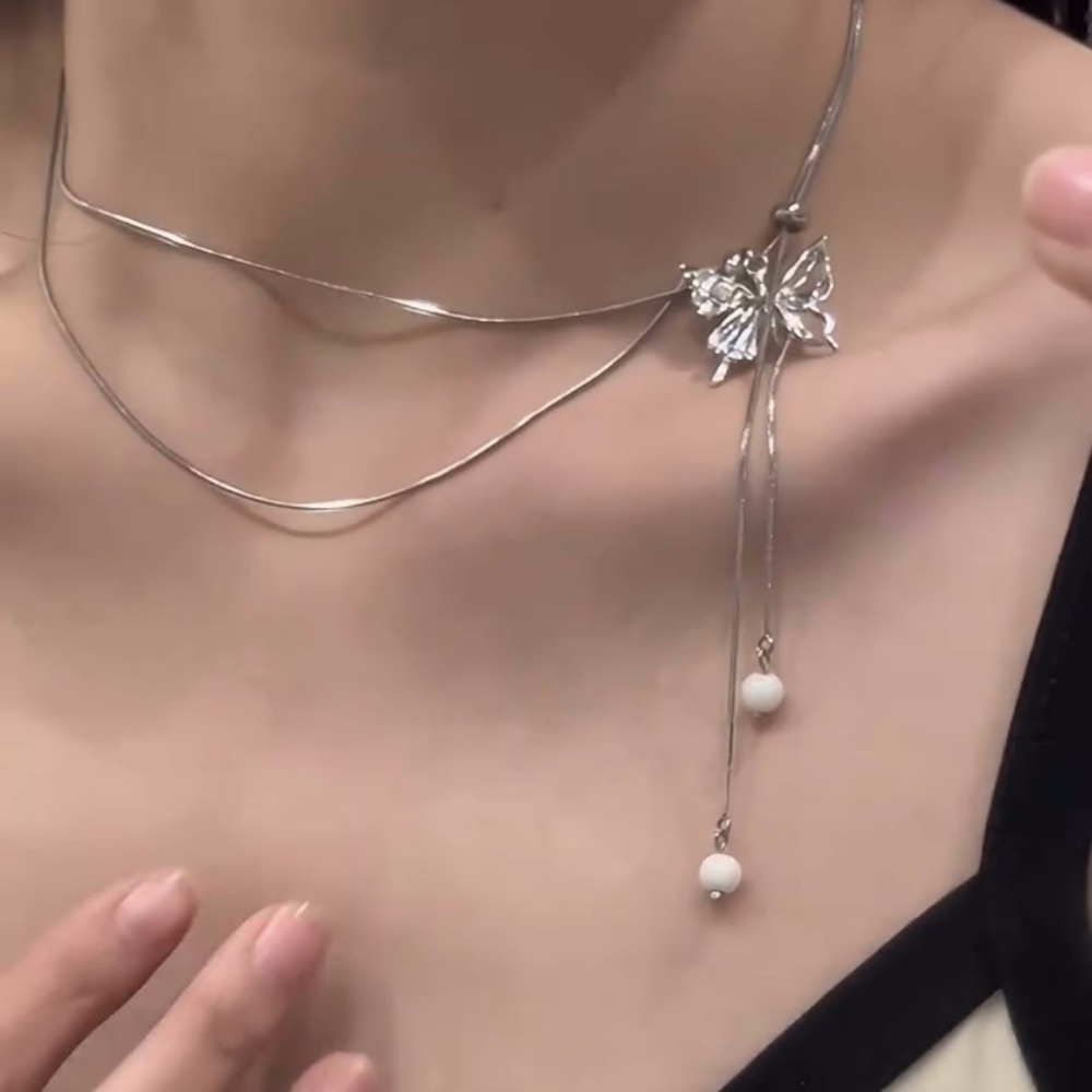 Perak Tarik Kupu-Kupu Rumbai Kalung Wanita Gaya Frosty Kepribadian Niche Desain Kalung Cahaya Mewah High-end Klavikula Rantai Perhiasan Gadis Seksi