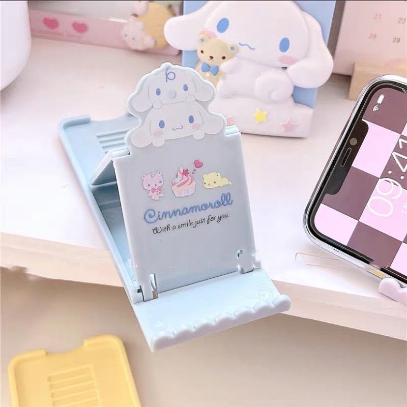 Kuromi Kartun Phone Holder Cinnamoroll Berlubang Desktop Lazybone Phone Holder Base Desktop Ornamen Hias Dapat Dilipat Holder