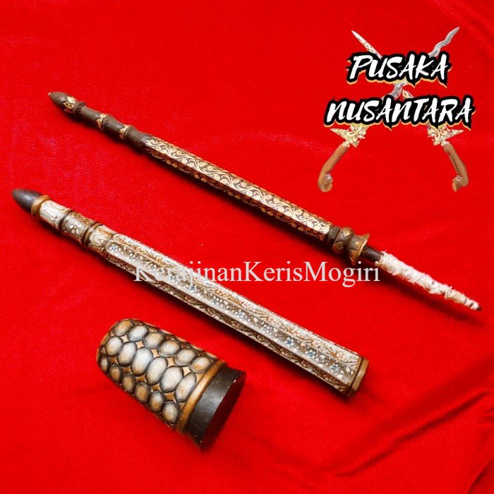 

Monumen / Menara / Maskot Tombak Pamor Keleng Kinatah Emas Murni Termurah