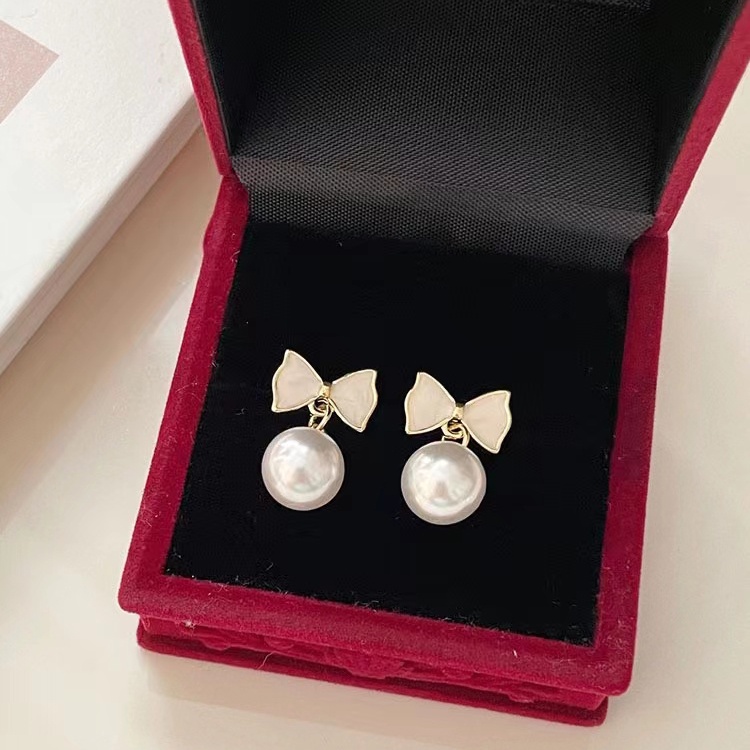 S925 Perak Jarum Busur Mutiara Stud2023Baru Pasang Niche Desain Rasa Senior Anting-Anting Perempuan
